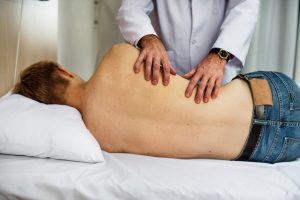 Examining a patient's spinal alignment